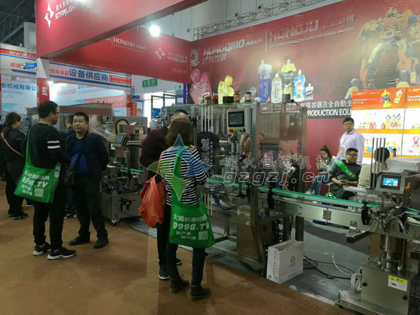 全自動(dòng)雙頭醬料灌裝旋蓋一體機(jī)